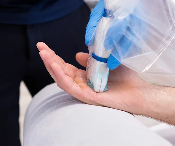 physiotherapist treating hand and wrist pain