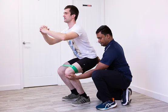 Raj Nedunchezian treating a patient at Relive Physiotherapy